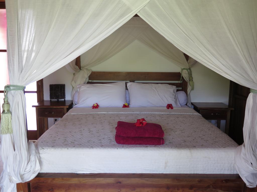 Sunia Loka Bungalows & Dive Center ペムテラン エクステリア 写真